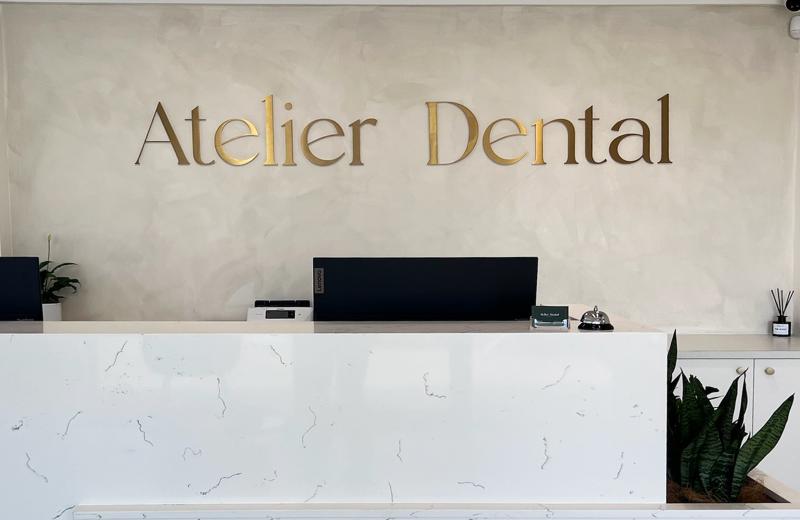 Atelier-Dental-Brass-Sign-Installed