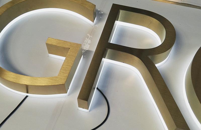 frosted-acrylic-under-brass-fab-letters