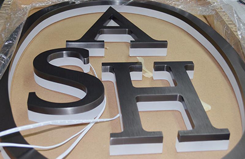 titanium-letters-with-acrylic-undernaeth