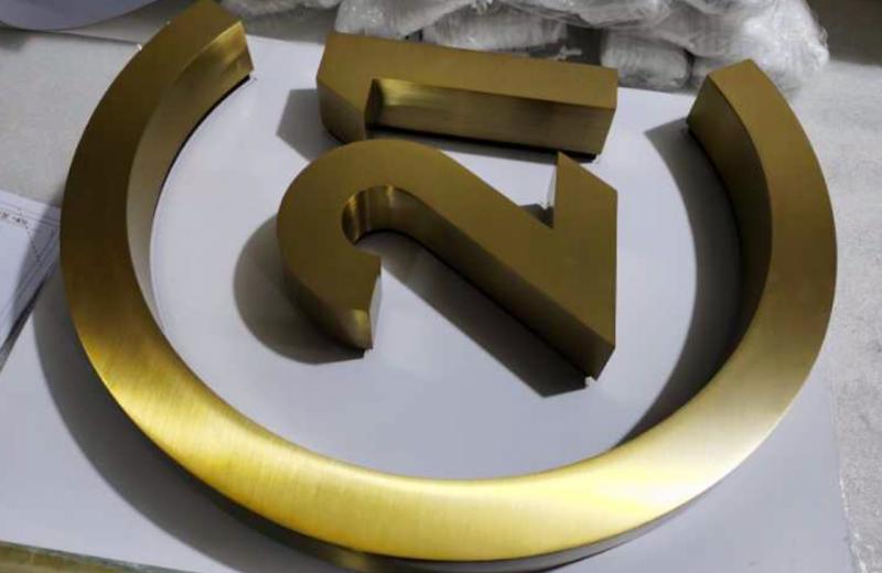 c21-fabricated-brass-logo