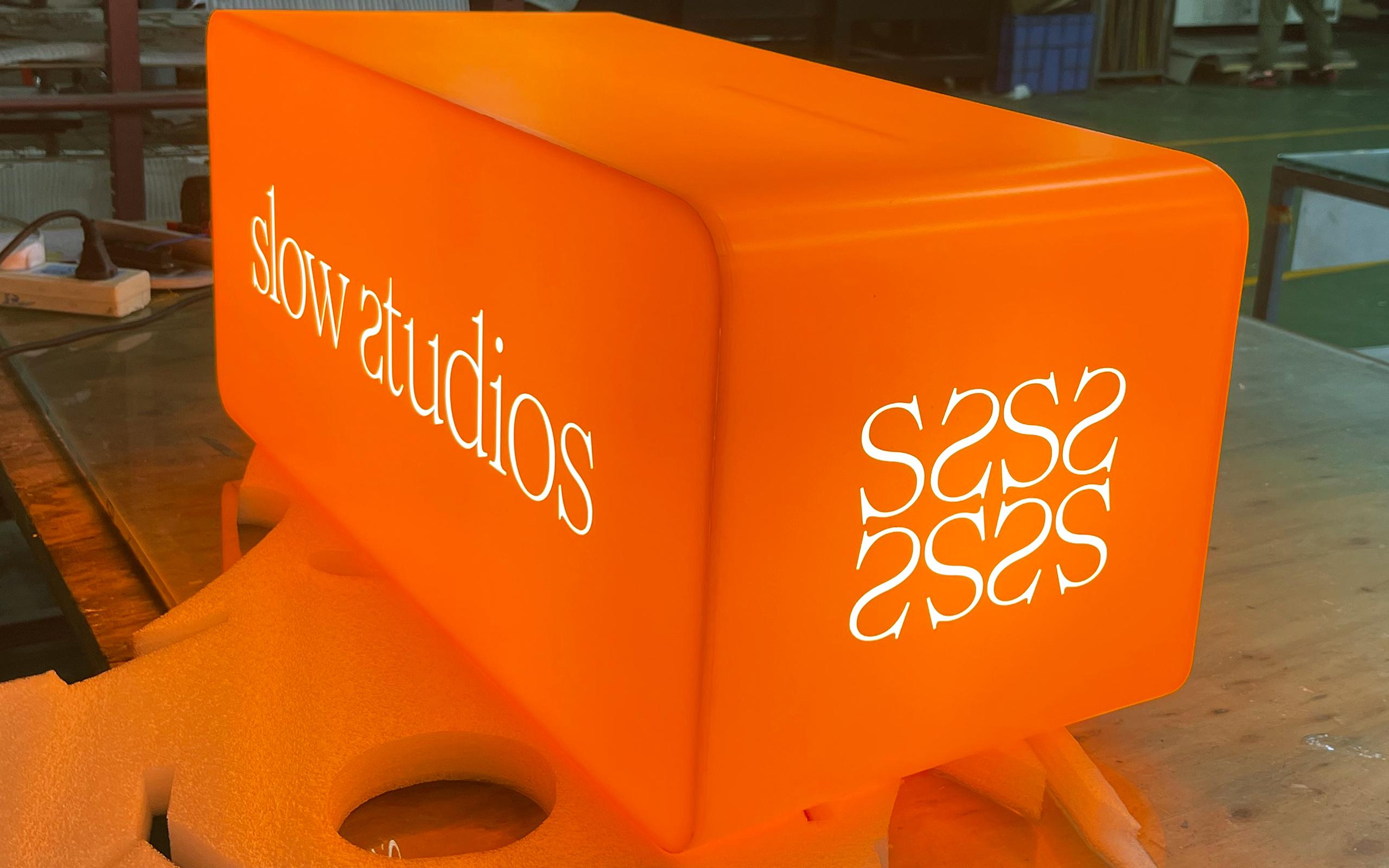 acrylic-fully-illuminated-orange-lightbox-with-light-up-graphics