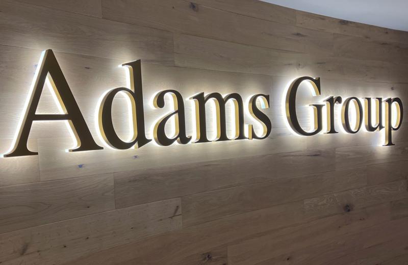 adams-group-brass-backlit-sign-on