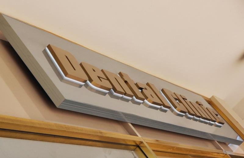 brass-back-lit-signage-in-slim-frame
