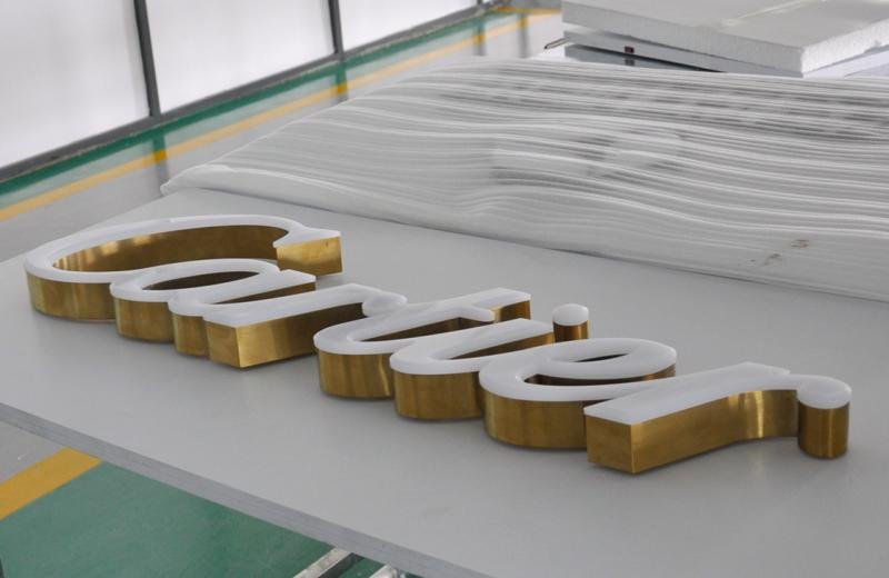 brass-fabricated-sign-with-raised-faces-to-illuminate