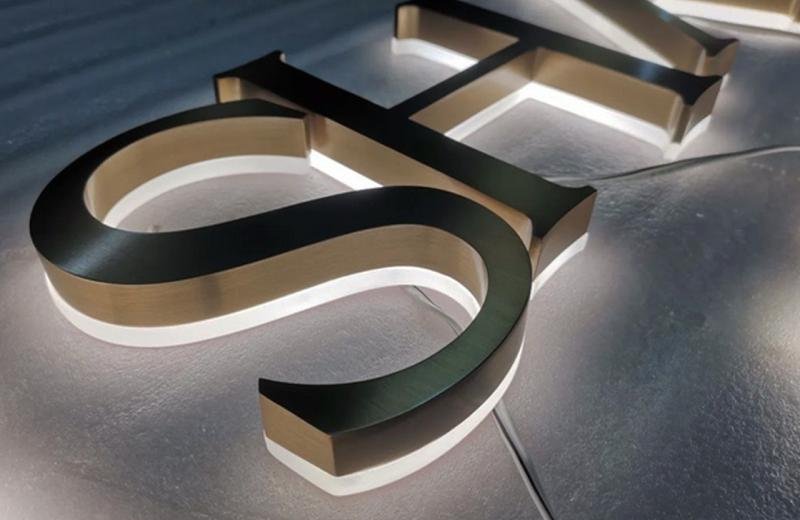 bronze-lettering-sign-with-back-lighting