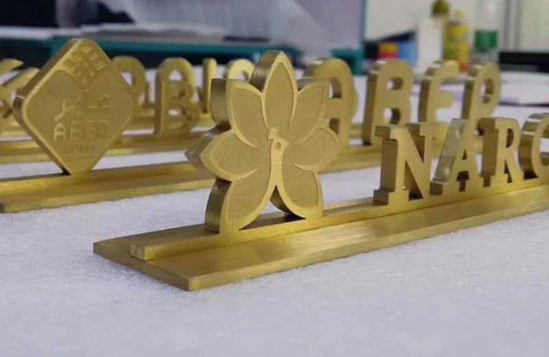 free-standing-brass-desk-signage