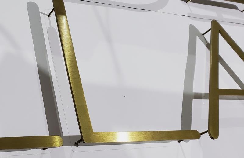 metal-letters-in-brass-on-pins