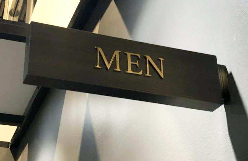 mirror-polished-letters-on-aged-brass
