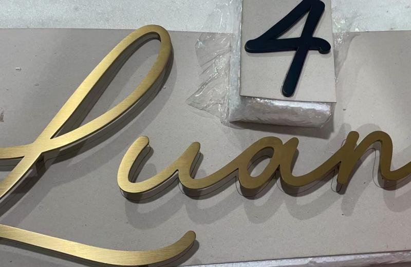 solid-metal-brass-brushed-letters-on-pins