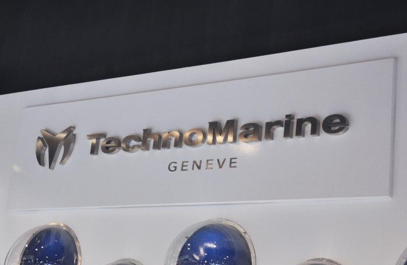 technomarine-sign-on-back-board