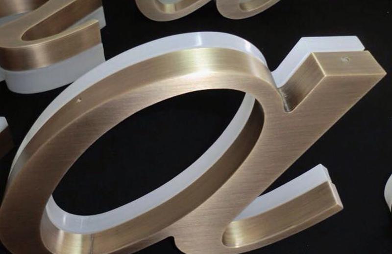 aged-brass-detailed-sign-solid-metal-a