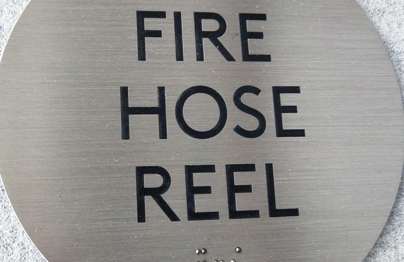 engraved-plaque-with-braille-paint-filled