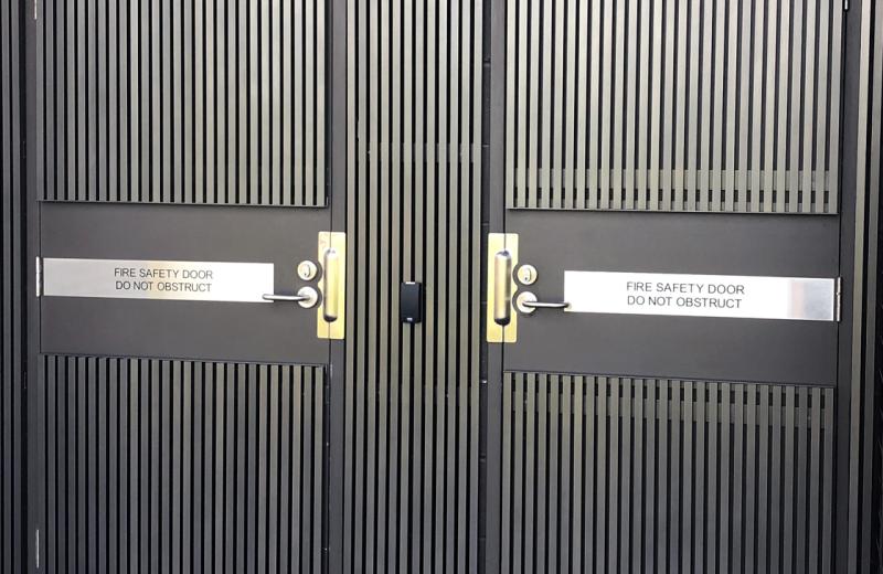 side-by-side-fire-doors-with-plaques-engraved