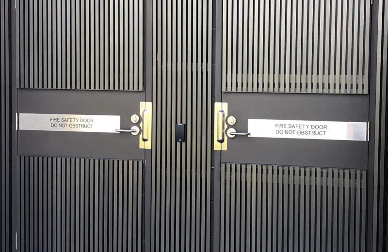 side-by-side-fire-doors-with-plaques-engraved
