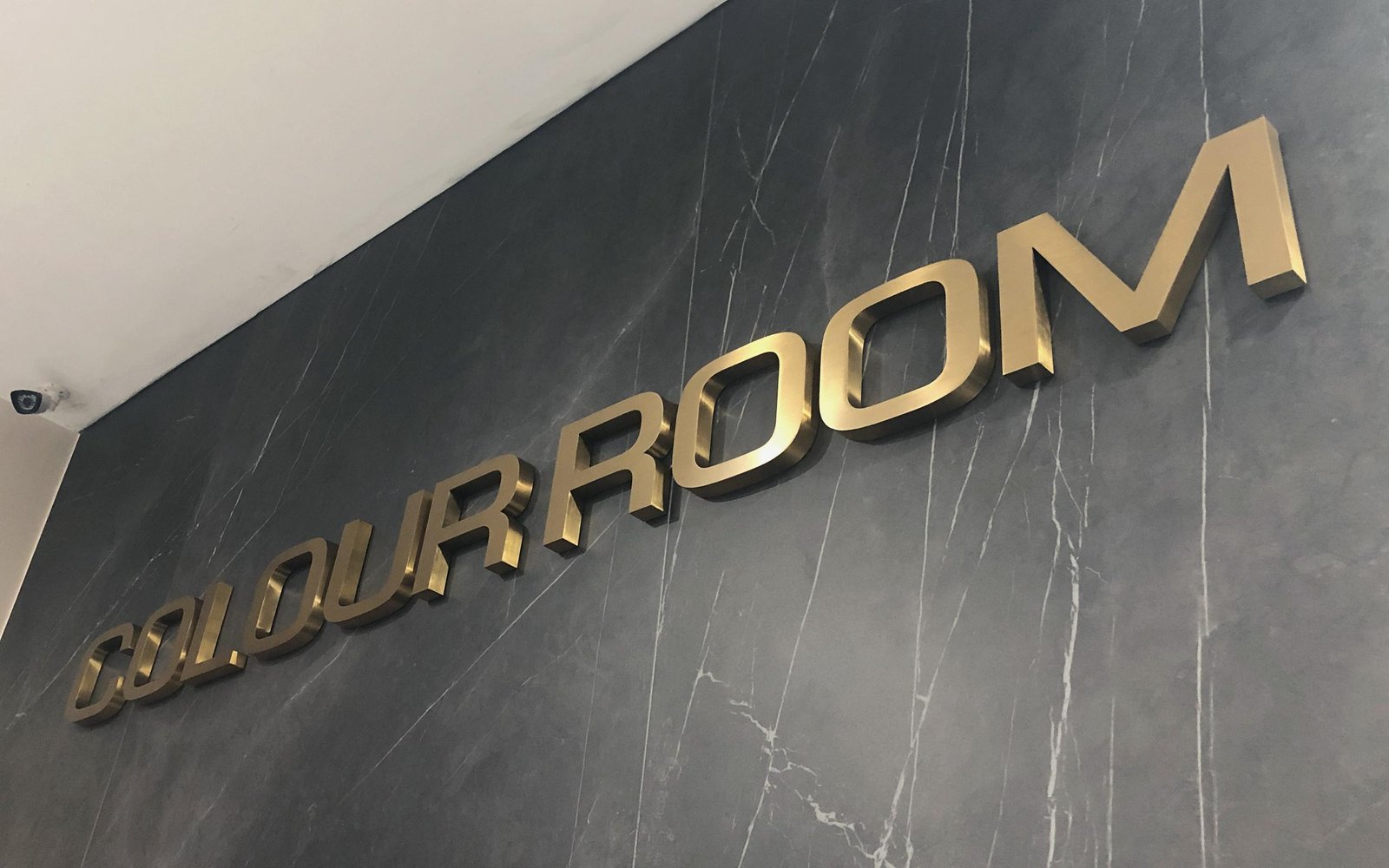 fabricated-brass-metal-logo-with-brushed-edges-and-faces