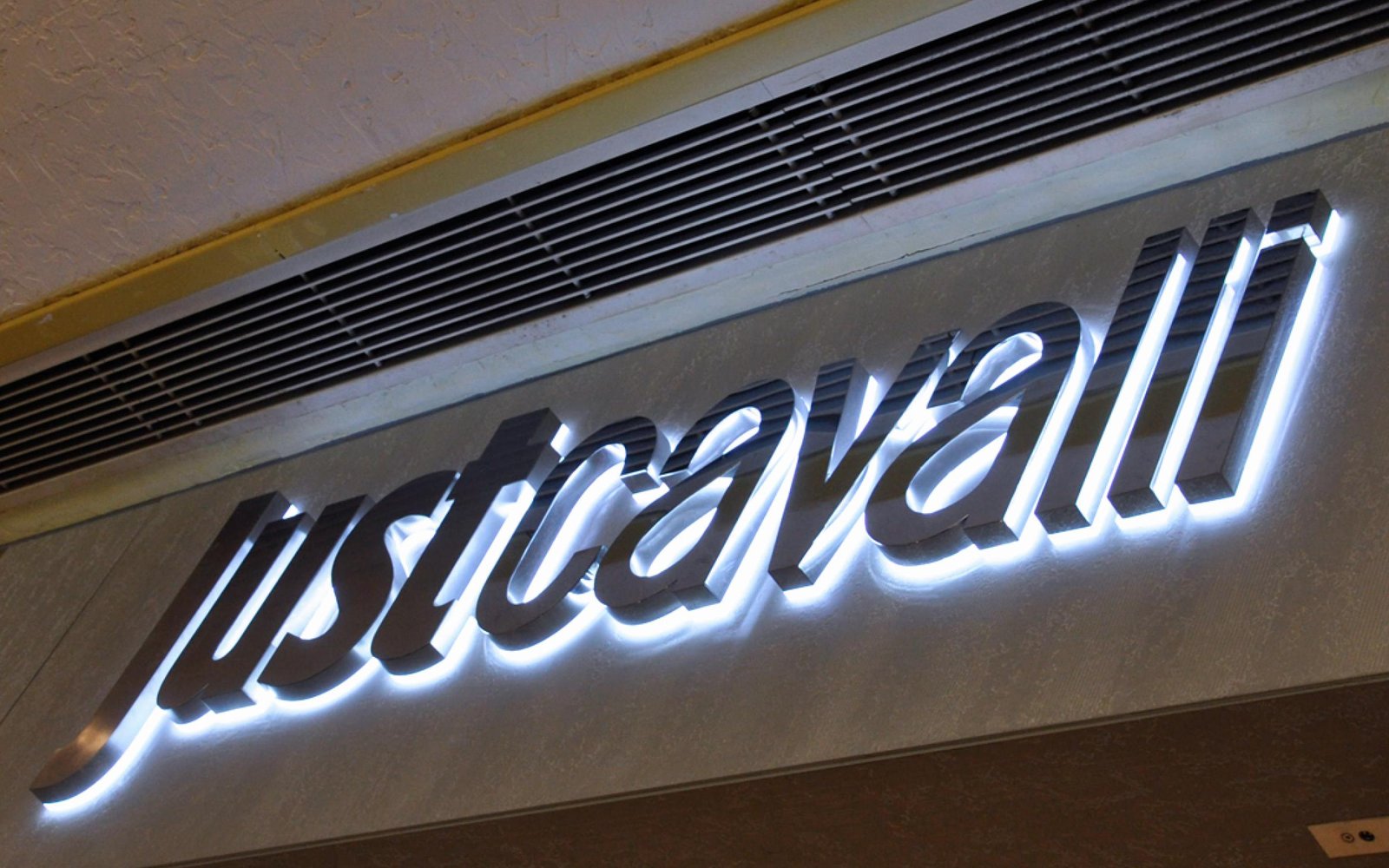 just-cavalli-illumination-under-metal-letters-mirror-polished
