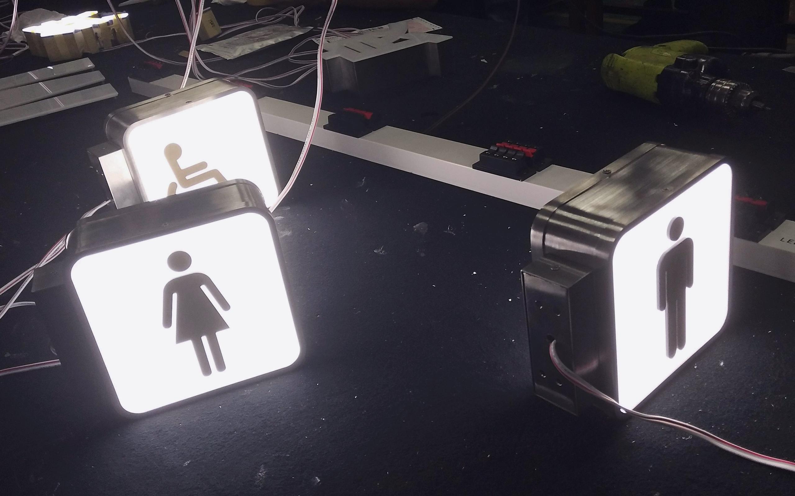3-illuminated-toilet-signs