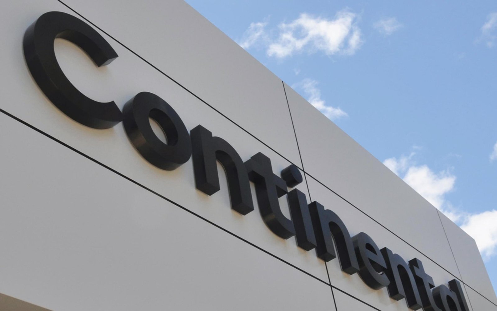 continental-outdoor-brushed-titanium-fabricated-3d-sign