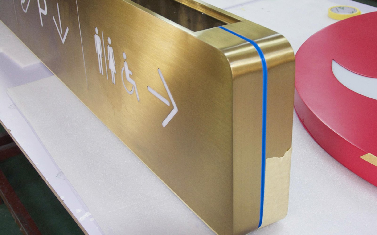 detailed-brass-briushed-fabricated-wayfinding-sign